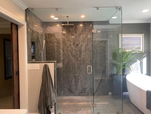 glass shower and white tub